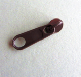 Ritsschuiver bruin past op de 4 mm rits