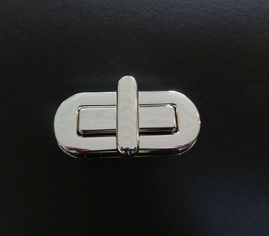 Tasslot  nikkel kleurig 4 cm lang draaislot